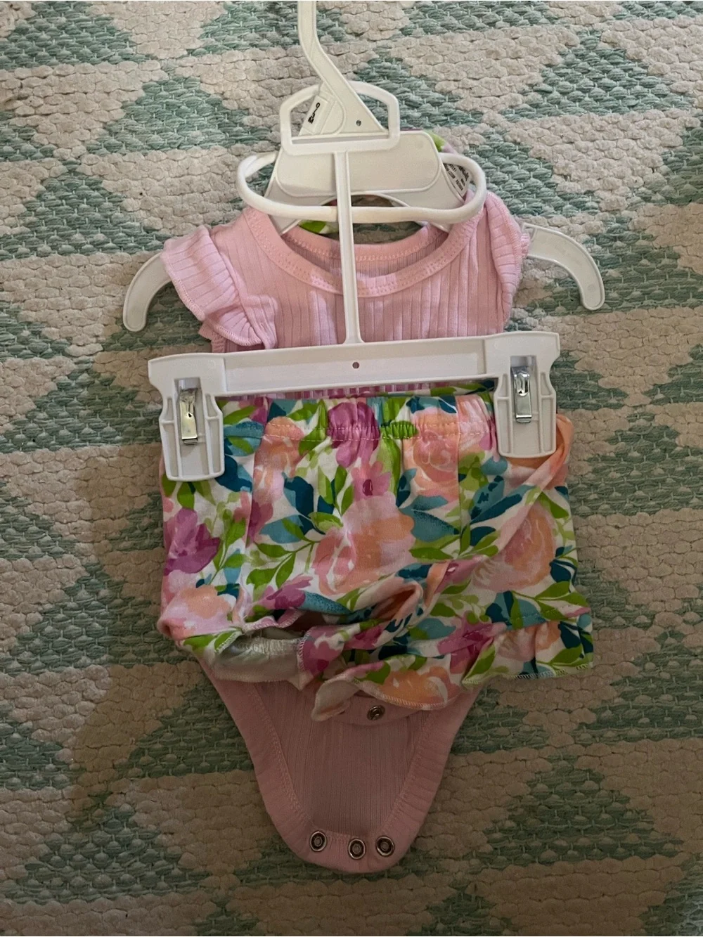 Baby Essentials Pink Ribbed One-Piece with Floral Bow Accent